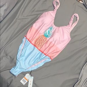 Brand new with tags; one piece bathing suit!